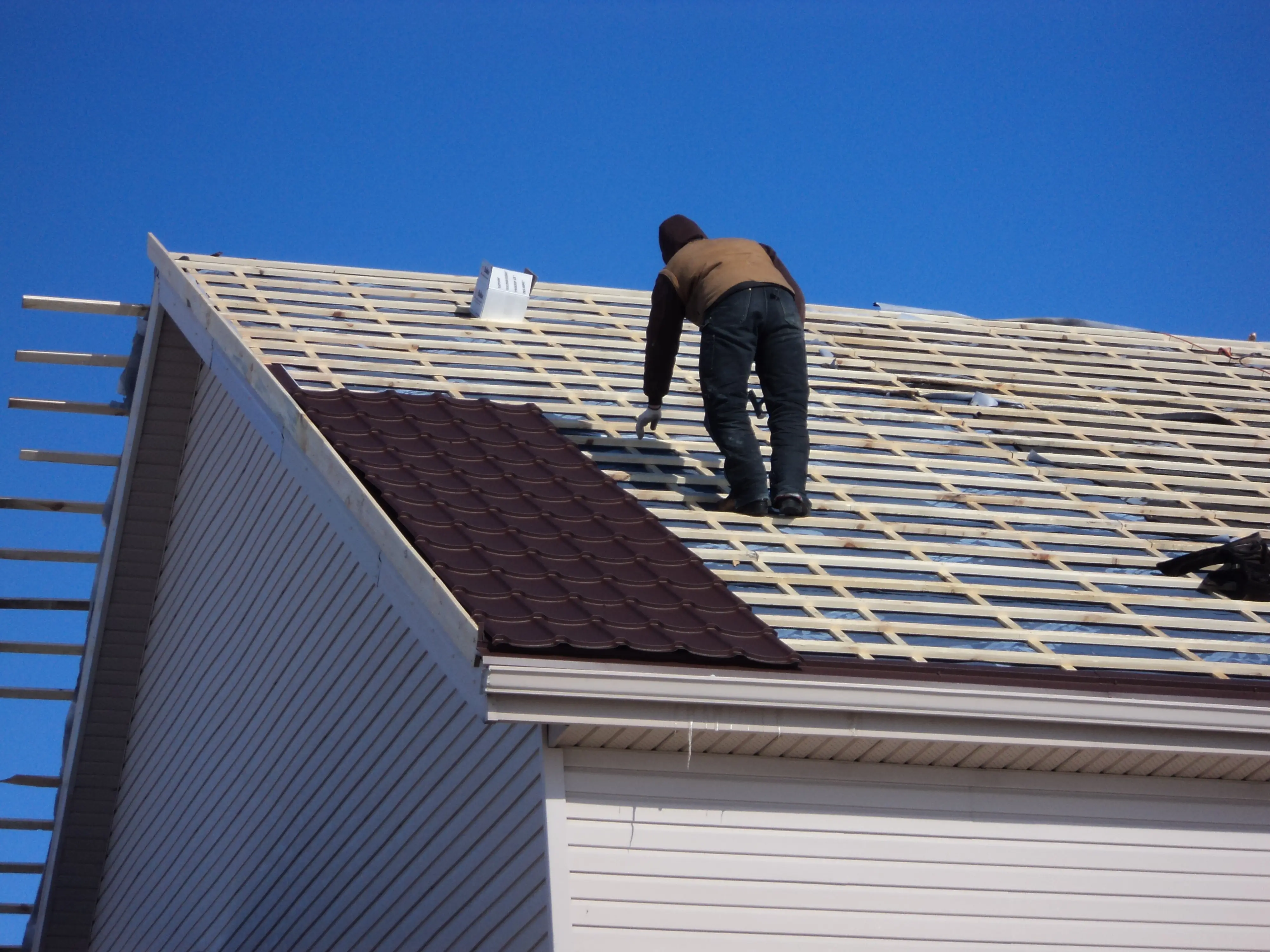 Metal Roof Installation on Strapping
